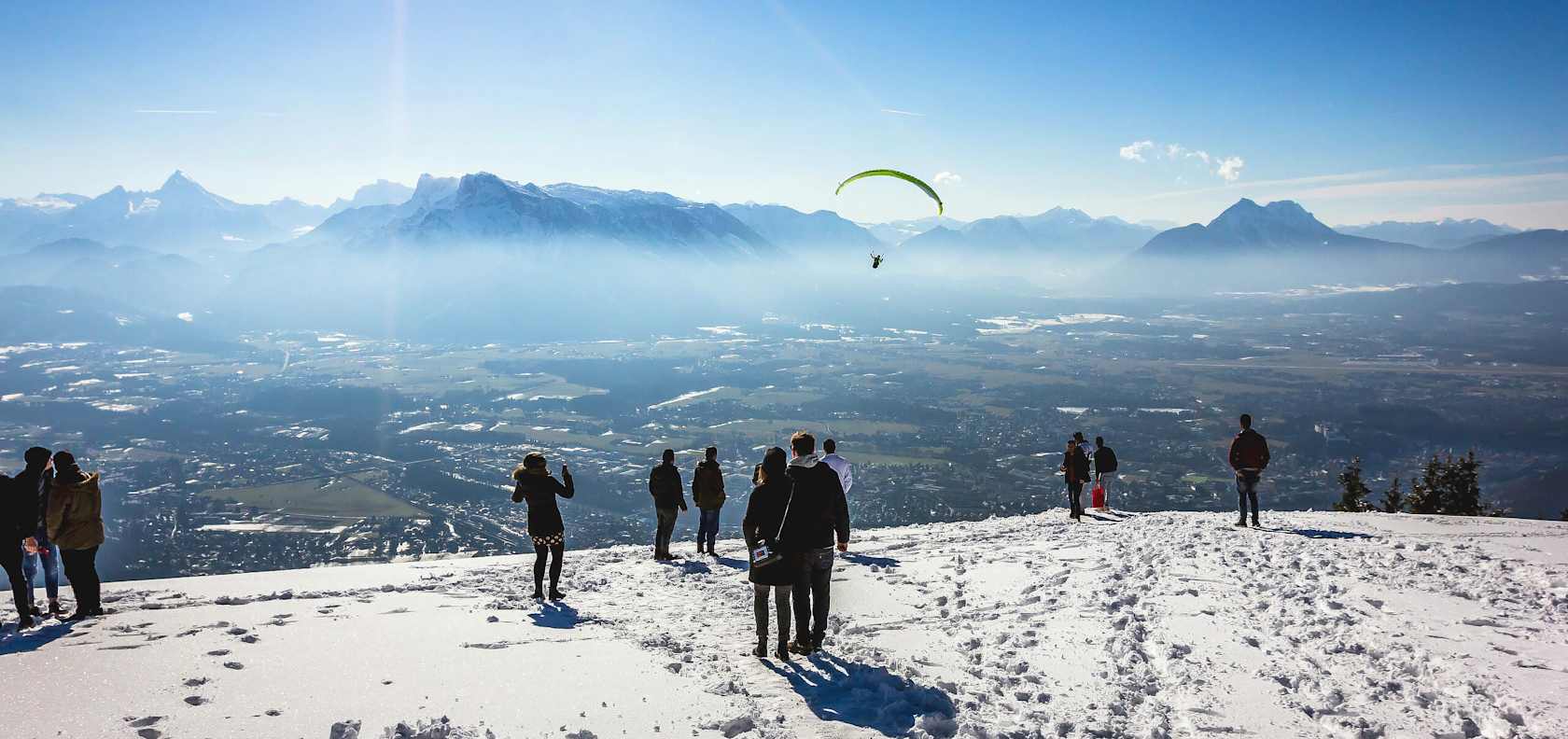 A high landscape with snow, overlooking the city.