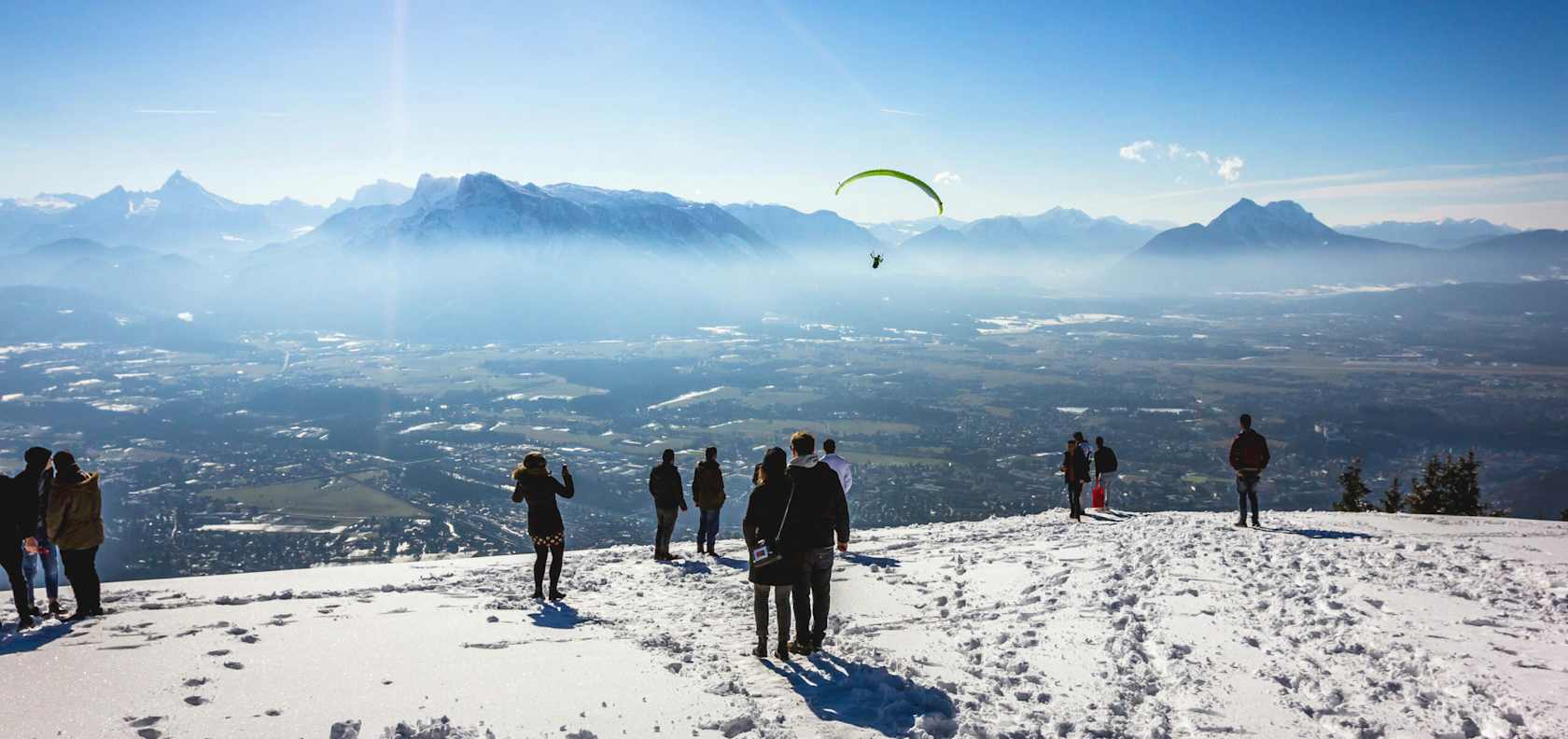 A high landscape with snow, overlooking the city.