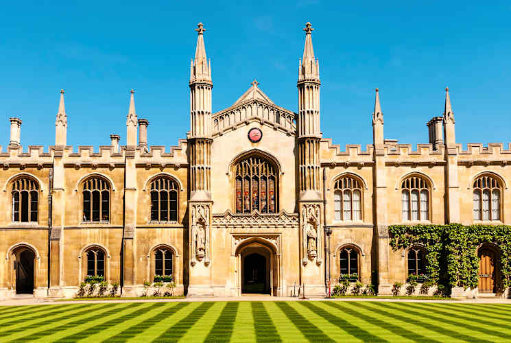 The front of a large castle-like building in Cambridge, England.