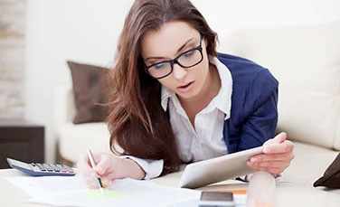 Woman doing accounting work.