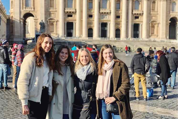 A group of four women in Italy.