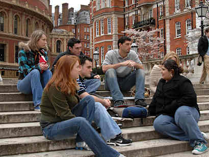 Students sitting on steps outside in London.