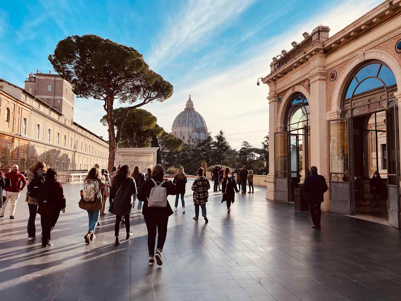A group of students walking outside the Vatican.