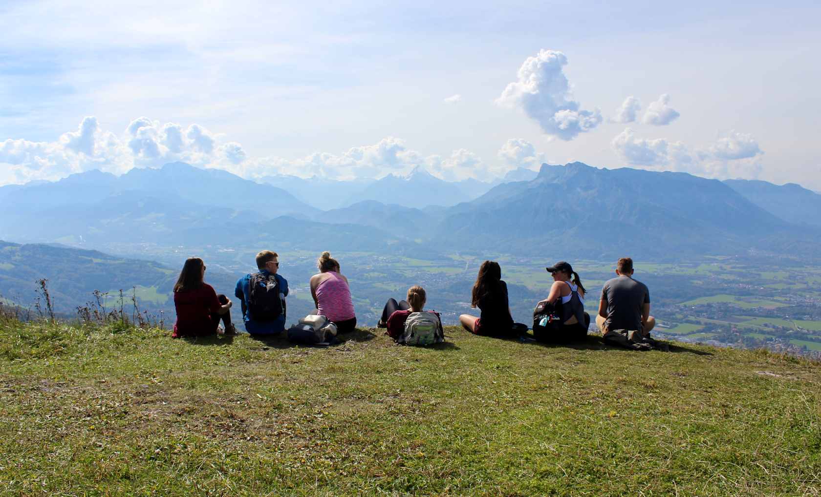 A group of students looking at Gaisberg Mountain in Austria.