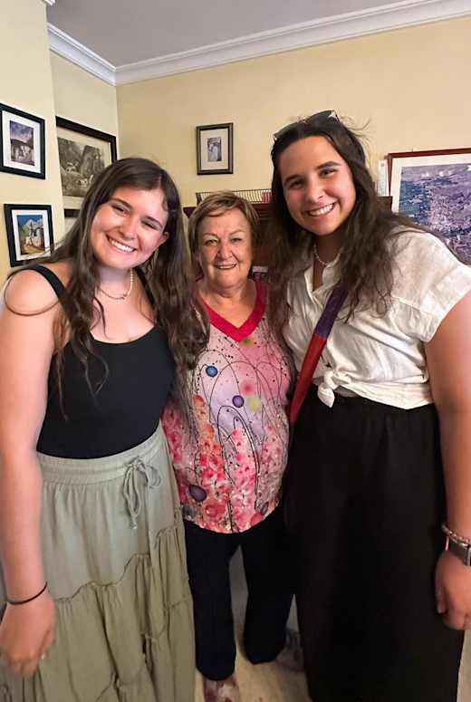 Two students and their host mother in Seville, Spain.
