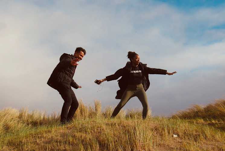 Two students in a field in Limerick, Ireland.