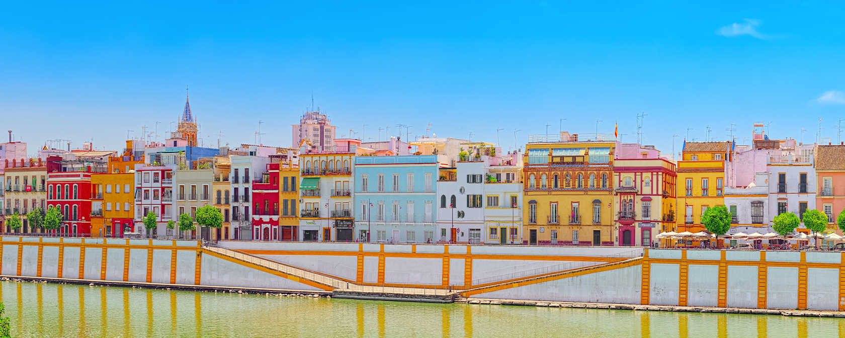 View of Seville, Spain, along a river.