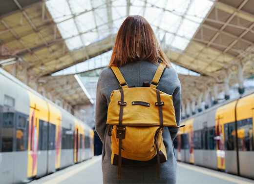 Student in train station in Europe.