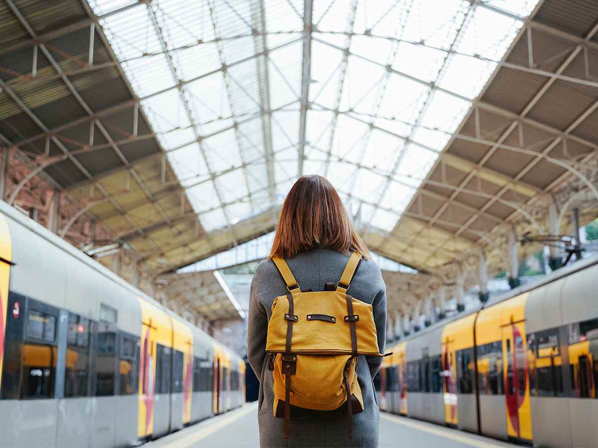 Student in a train station in Europe.